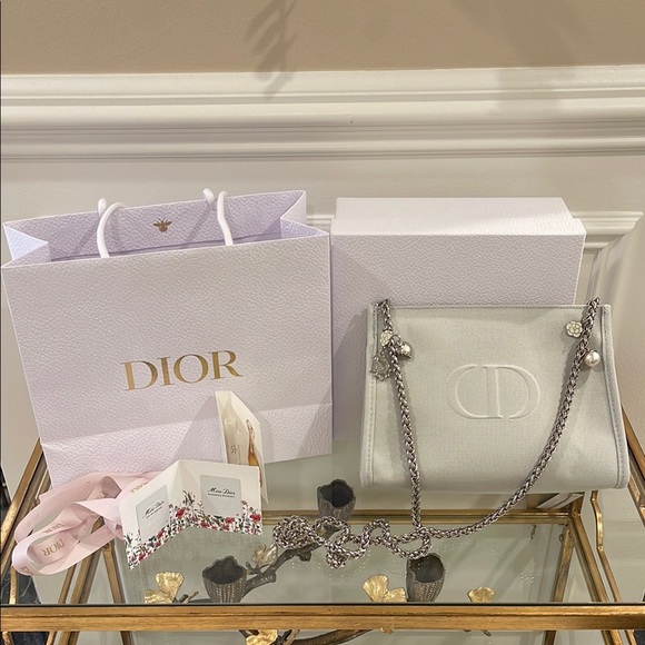 Dior Handbags - Dior White Cosmetic Bag with Textured Finish